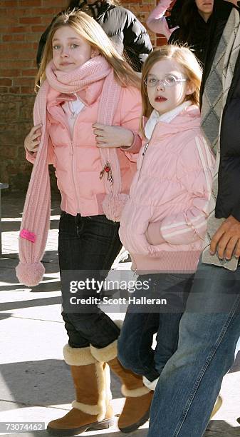 Actress Dakota Fanning and sister Elle Fanning walk on Main Street during the 2007 Sundance Film Festival on January 22, 2007 in Park City, Utah.