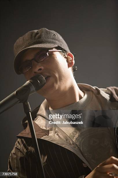 Singer Xavier Naidoo of the German pop/rap band Soehne Mannheims performs during a concert at the Columbiahalle January 22, 2007 in Berlin, Germany....