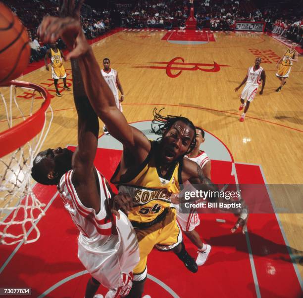 Mutumbo Rockets 91 Dikembe Mutombo Sonics Photos & High Res Pictures - Getty Images
