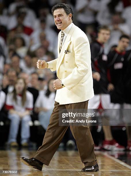 Head Coach of the Louisville Cardinals Rick Pitino celebrates during the Big East Conference game against the Connecticut Huskies at Freedom Hall...