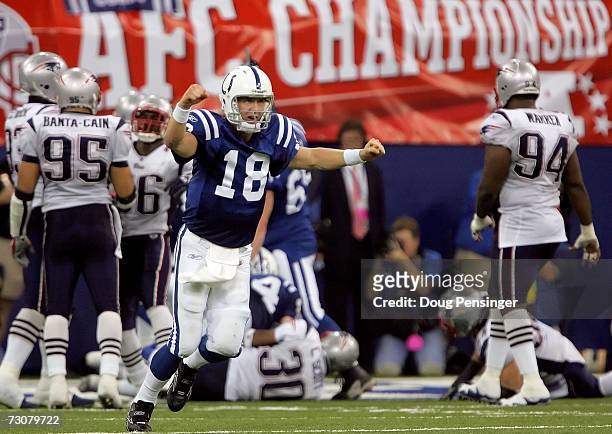 Quarterback Peyton Manning of the Indianapolis Colts celebrates defeating the New England Patriots 38-34 in the AFC Championship Game on January 21,...