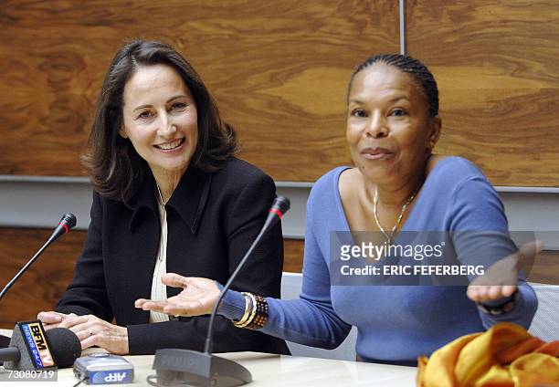 French Socialist presidential candidate Segolene Royal listens to French leftist Radical Party deputy Christiane Taubira , 23 January 2007 during a...