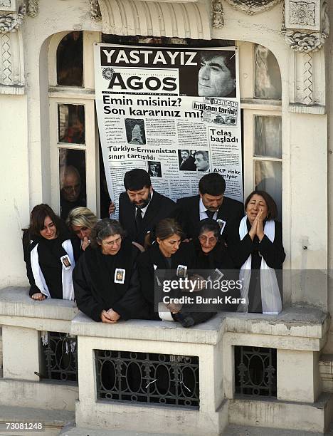 Workers from the Agos Newspaper attend the funeral ceremony of Turkish-Armenian journalist, Hrant Dink, on January 23, 2007 in Istanbul, Turkey....