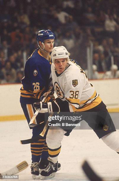 Canadian professional ice hockey player Kraig Nienhuis of the Boston Bruins skates on the ice during a game against the Buffalo Sabres, Boston...