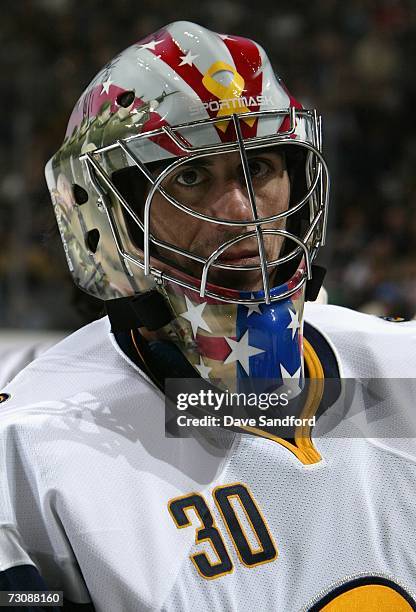 Eastern Conference All-Star Ryan Miller of the Buffalo Sabres warms up in a goalie mask painted in honor of the U.S. Troops serving overseas during...