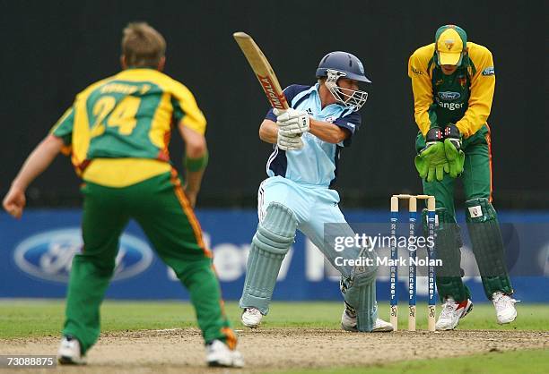 Nolan Stringer David Warner of the Blues plays a shot square of the wicket during ...