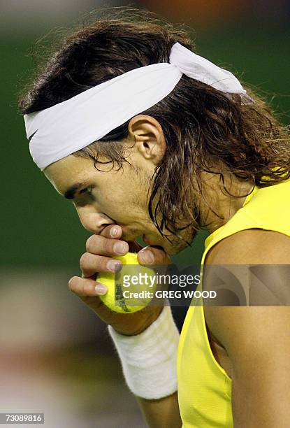 Rafael Nadal of Spain gestures while playing against Fernando Gonzalez of Chile in their men's singles quarter-final match at the Australian Open...