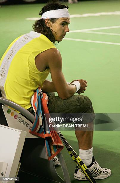 Rafael Nadal of Spain looks dejected near the end of his defeat to Fernando Gonzalez of Chile in their men's singles quarter-final match at the...