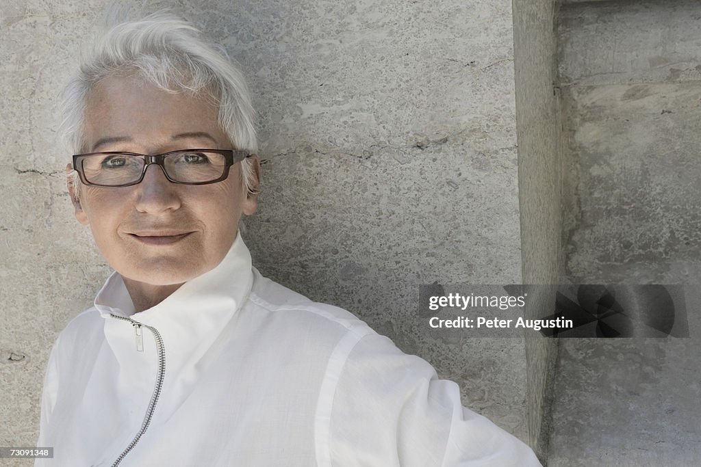 Senior woman wearing spectacles, outdoors, portrait