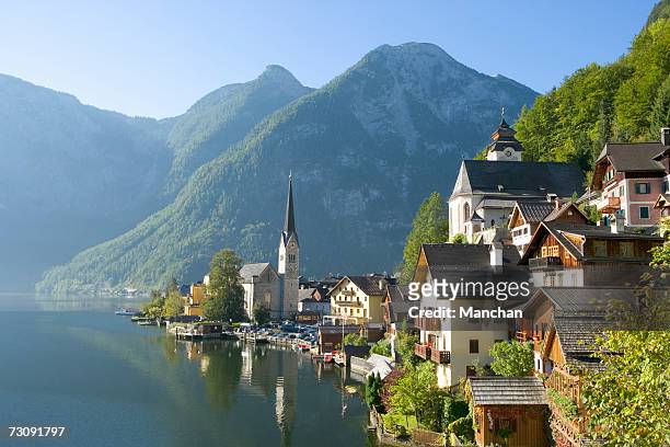 austria, salzburger land, hallstatt town by lake - austria stock pictures, royalty-free photos & images