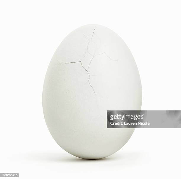 egg, cracks on surface, close up - animal egg stock pictures, royalty-free photos & images