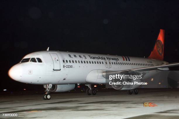An A320 from Shanghai to Taiwan is seen on the tarmac at Shanghai Pudong International Airport before a humanitarian rescue mission, on January 23,...