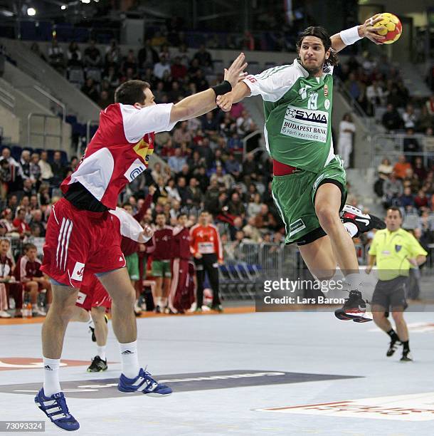 Laszlo Nagy of Hungary shoots the ball during the Men's Handball World Championship Group II game between the Czech Republic and Hungary at the SAP...