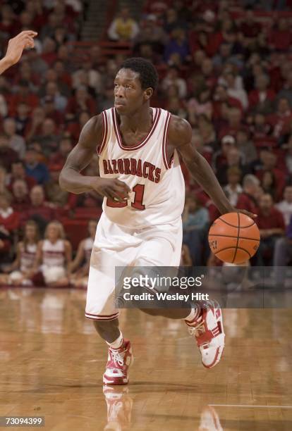 Guard Patrick Beverly of the Arkansas Razorbacks dribbles the ball down the court against the LSU Tigers at Bud Walton Arena on January 20, 2007 in...