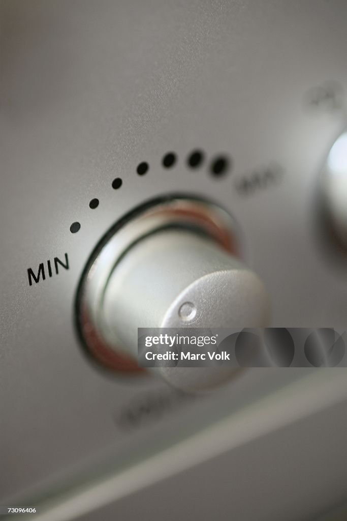 Close-up of volume control on stereo