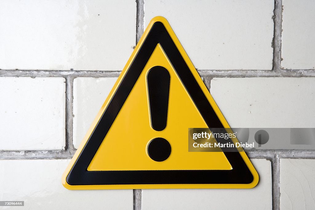 ?Hazard? warning sign