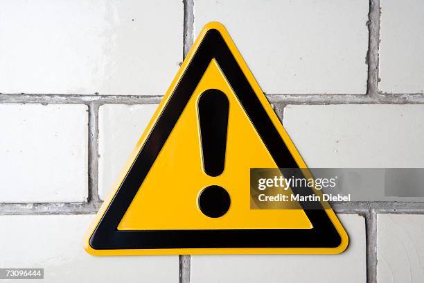 ?hazard? warning sign - warning sign foto e immagini stock