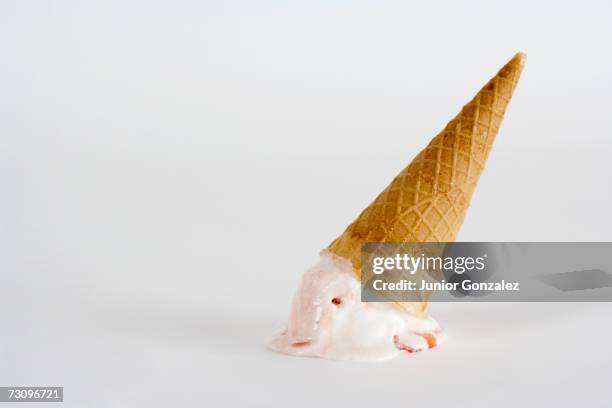 upside down ice cream cone - misserfolg stock-fotos und bilder