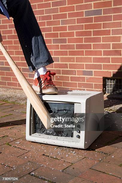 man holding a baseball bat to a smashed monitor - pants pulled down stock pictures, royalty-free photos & images