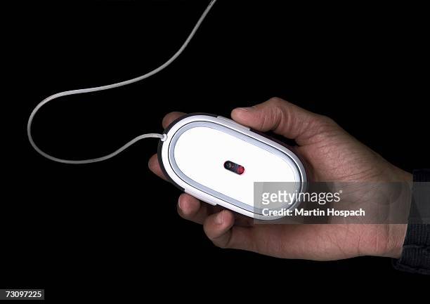 man using a computer mouse - click below stock pictures, royalty-free photos & images