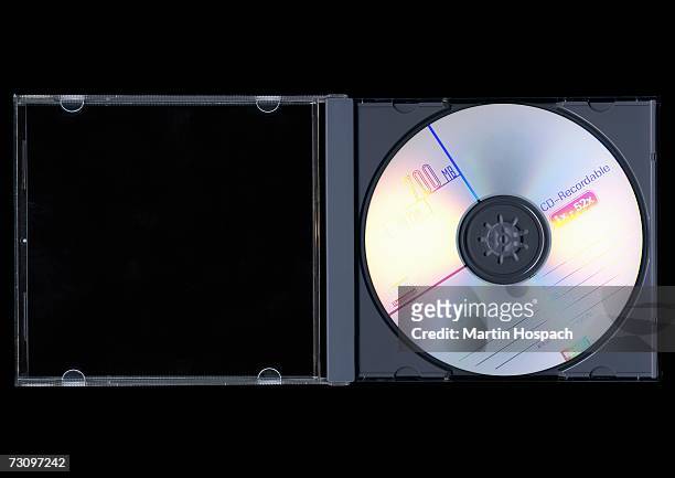 compact disk in a plastic cover - rom stock pictures, royalty-free photos & images
