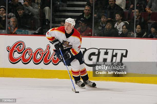 Jay Bouwmeester of the Florida Panthers skates with the puck against the Vancouver Canucks at General Motors Place on January 7, 2007 in Vancouver,...