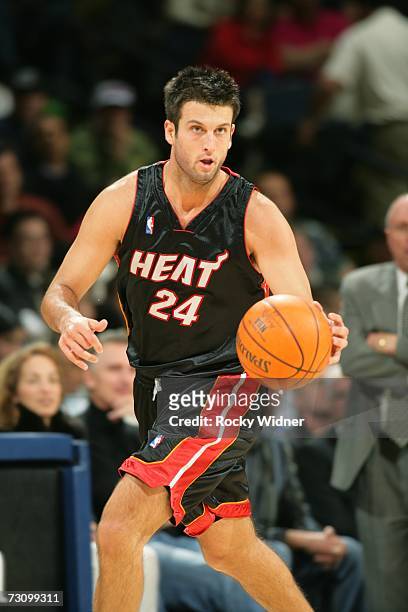 Jason Kapono of the Miami Heat moves the ball against the Golden State Warriors on January 12, 2007 at Oracle Arena in Oakland, California. The Heat...