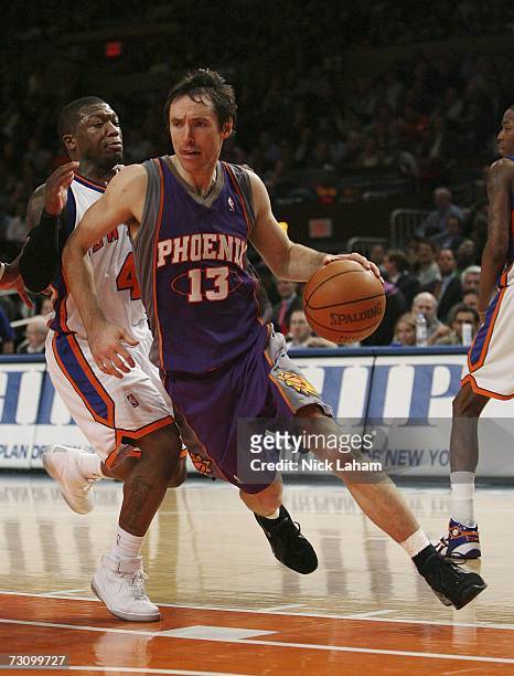 Steve Nash of the Phoenix Suns drives against Nate Robinson of the New York Knicks January 24, 2007 at Madison Square Garden in New York City. NOTE...
