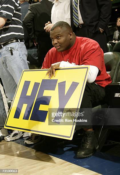 Anthony "Booger" McFarland of the Indianapolis Colts watches as the Pacers take on the Miami Heat at Conseco Fieldhouse on January 24, 2007 in...