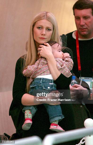 Actress Gwyneth Paltrow arrives holding London Williams to read to the local children at the Village at the Lift during the 2007 Sundance Film...