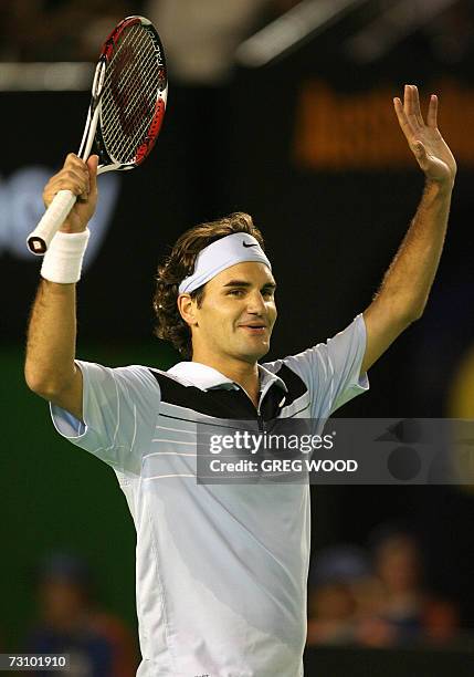 Roger Federer of Switzerland celebrates his victory in the men's singles semifinal match against Andy Roddick of the US at the Australian Open tennis...