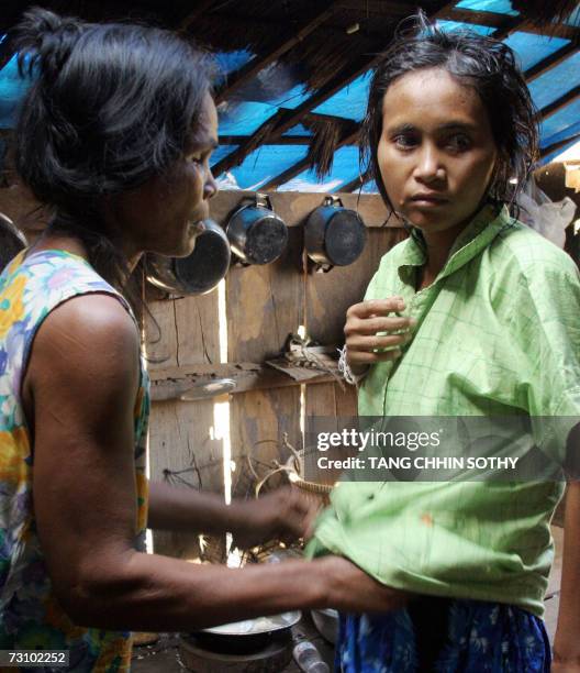 Rochom Soy , would-be mother of a Cambodian missing girl Rochom P'ngieng, takes care of her at Oyadao district in Rottanakiri province, some 610...