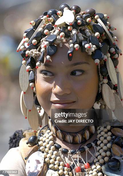 Performers dances in the street, during the culmination of the nine-day religious festival called Sinulog, in Cebu city, 21 January 2007. Sinulog is...