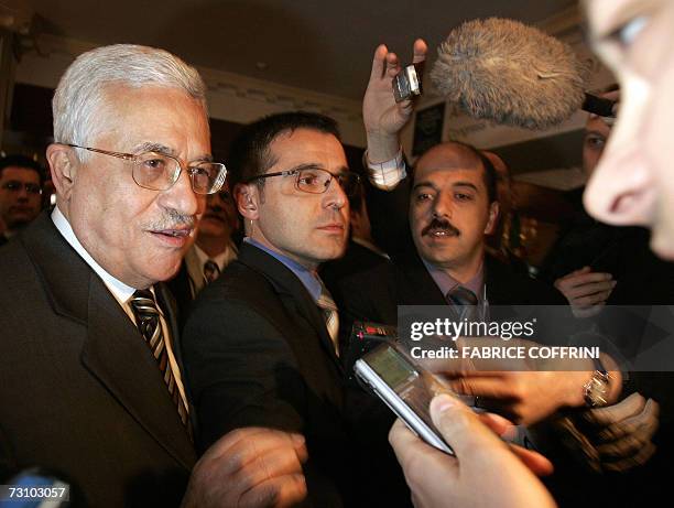 Palestinian president Mahmud Abbas answers journalist's questions, 25 January 2007 in Davos, prior to a meeting with German Chancellor Angela Merkel...