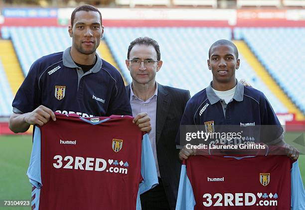 John Carew and Ashley Young of Aston Villa pose with Martin O'Neill during a photocall at Villa Park on January 25, 2007 in Birmingham, England.