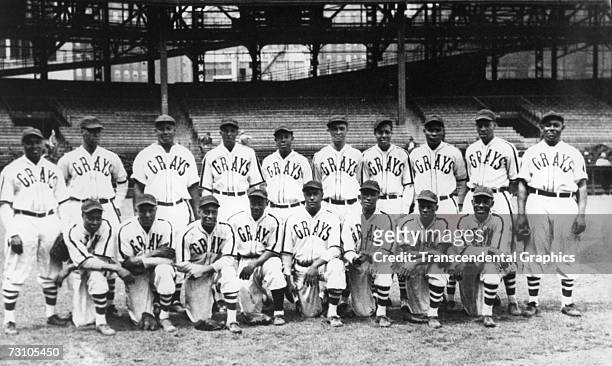 The Homestead Grays Negro League baseball club pose for a team shot in their home park, Forbes Field in Pittsburgh, in 1942. Hall of Fame members on...