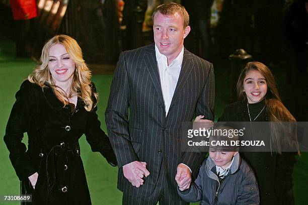 London, UNITED KINGDOM: US Pop Star Madonna, her husband and British Film Director Guy Ritchie and children, Rocco and Lourdes arrive at the British...
