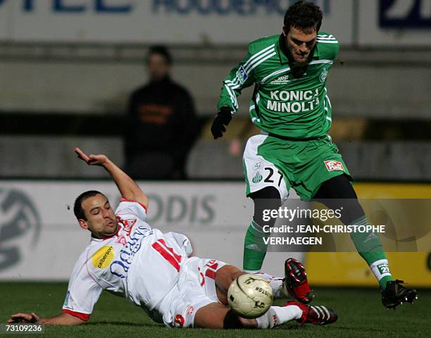 Nancy's midfielder Pascal Berenguer vies with Saint-Etienne's midfielder Julien Sable Fourtassou during their French L1 football match, 25 January...