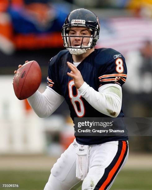 Quarterback Rex Grossman of the Chicago Bears looks to pass against the Seattle Seahawks during their NFC Divisional Playoff Game January 14, 2007 at...