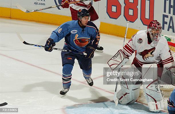 Jason Krog of the Atlanta Thrashers skates to the net against Curtis Joseph of the Phoenix Coyotes on January 5, 2007 at Philips Arena in Atlanta,...