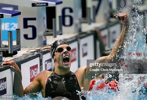 Ross Davenport of England celebrates after winning the gold medal in the men's 200m freestyle final during the swimming at the Melbourne Sports &...