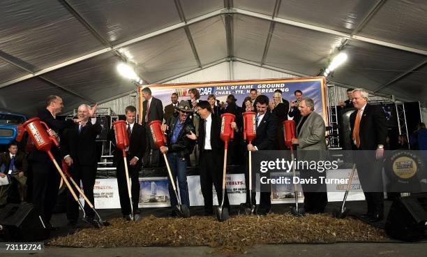 Grand Marshalls Tim Newman, Graham Denton, Bob Lauth, Richard Petty, Mayor Pat McCrory, NASCAR President Mike Helton, Rick Hendrick, and John Tate...