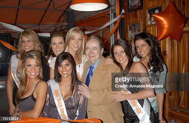Joe Franklin poses with Aimee Chuhaloff, Lilly Mikleu, Beverly Mullins, Anna Burns, Breanne Ashley and Danielle Schatz during the 2007 Hooters...