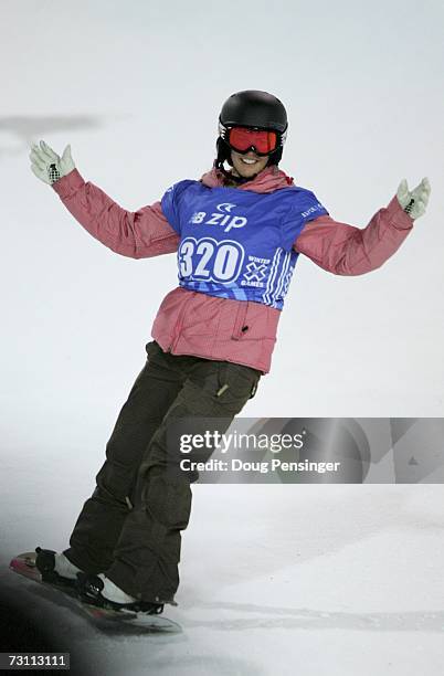 Torah Bright of Cooma, New South Wales, Australia, reacts after her first run as she went on to win the women's Snowboard Superpipe at the ESPN...