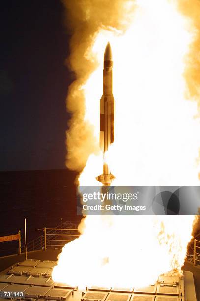 Standard Missile-3 interceptor is launched from the missile cruiser USS Lake Erie in the Pacific off the coast of Kauai June 13, 2002 in Hawaii. The...