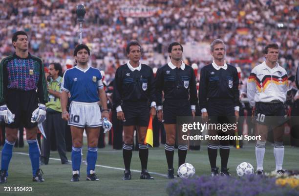 View of players and captains of the Argentina and West Germany teams pictured lined up together with match officials prior to the start of the 1990...