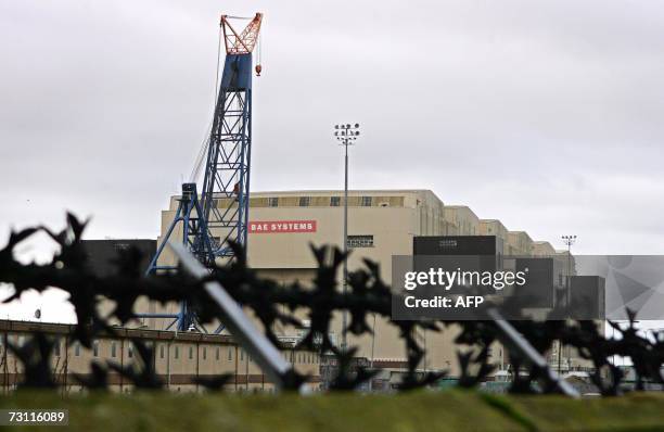 Barrow in Furness, UNITED KINGDOM: The BAE Systems construction hall dominates the skyline above the town of Barrow-in-Furness, north-west England,...