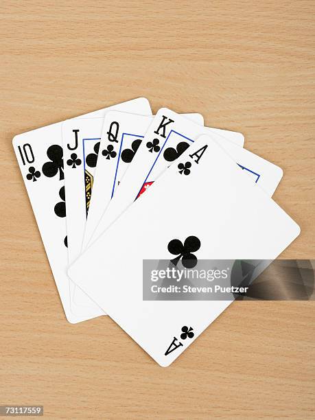 playing cards showing royal flush, close up - クラブのジャック ストックフォトと画像
