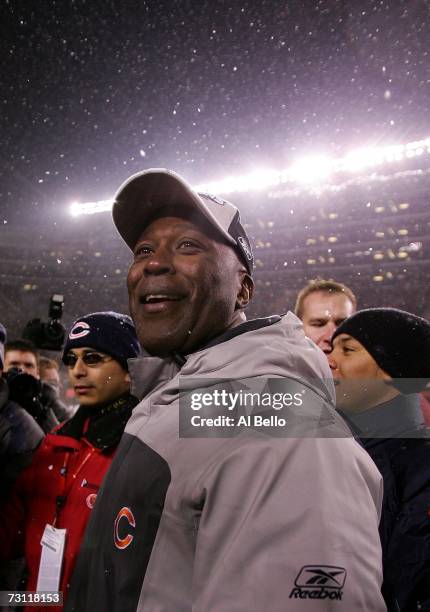 Head coach Lovie Smith of the Chicago Bears smiles on the field after the Bears 39-14 win against the New Orleans Saints during the NFC Championship...