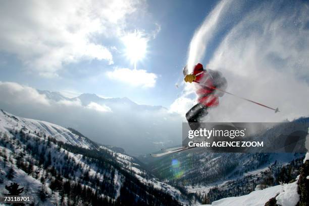 male skier in mid-air, in mountains - skier jumping stock pictures, royalty-free photos & images